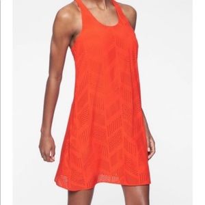 Athleta Brookfield racerback dress, size Medium. Gorgeous color called Fire.